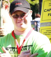An athlete with his medal